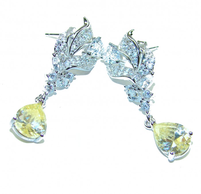 Authentic 4.5 carat Citrine .925 Sterling Silver brilliantly handcrafted earrings - Elegant Citrine earrings in sterling silver, front view close-up.