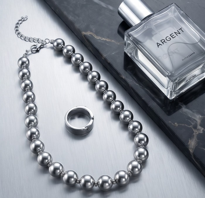 Fancy Italy made Silver Beads Sterling Silver necklace 16'' long, 10 mm wide - Top view of silver beaded necklace with ring and perfume bottle.