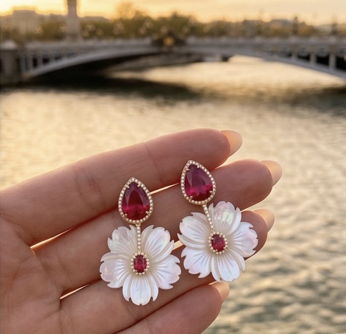 Summer Flowers Blister Pearl Red Topaz 14K Gold over .925 Sterling Silver handcrafted Earrings - Earrings with pearls and red topaz, held in hand by a river at sunset.