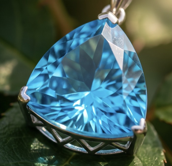 Trillion cut 28.5 carat Vintage style Swiss Blue Topaz .925 Sterling Silver DIPPED IN RHODIUM handmade Pendant - Close-up of trillion cut Swiss Blue Topaz pendant in silver setting