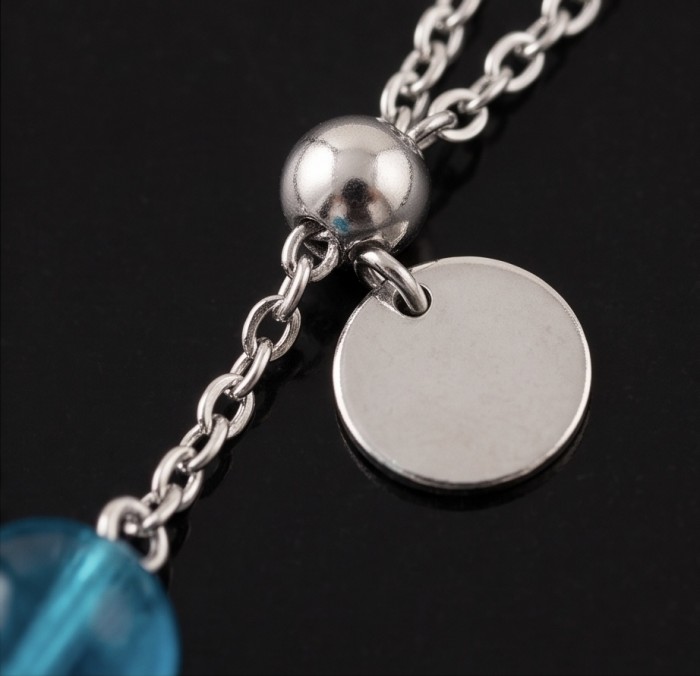 Dream 3.8 carat Apatite .925 Sterling Silver Handcrafted Statement earrings - Close-up of sterling silver chain and charm with blue stone detail