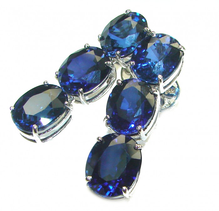 Deep Ocean 16.5 carat London Blue Topaz .925 Sterling Silver handmade Statement earrings - Close-up of Deep Ocean London Blue Topaz in sterling silver setting.