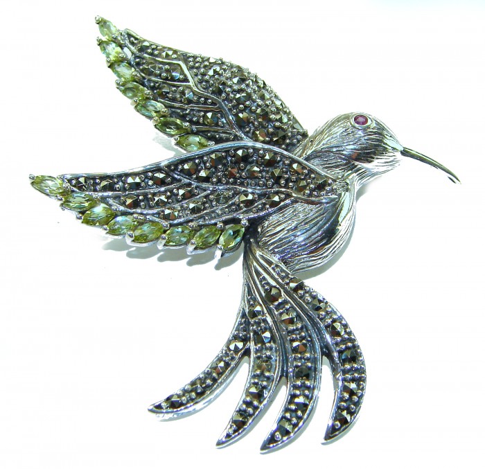 Incredible Flaying Bird Natural 5.9 carat Peridot Marcasite .925 Sterling Silver Brooch - Hummingbird brooch with peridot and marcasite, top view.