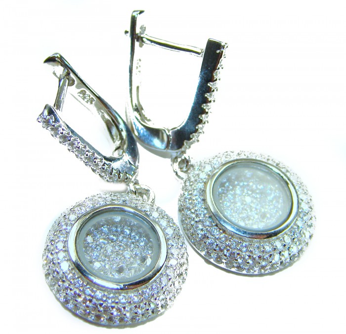 Floating Memories 11.5 carat White Topaz .925 Sterling Silver Handcrafted Statement earrings - Close-up of white topaz earrings with clasps, sparkling detail.