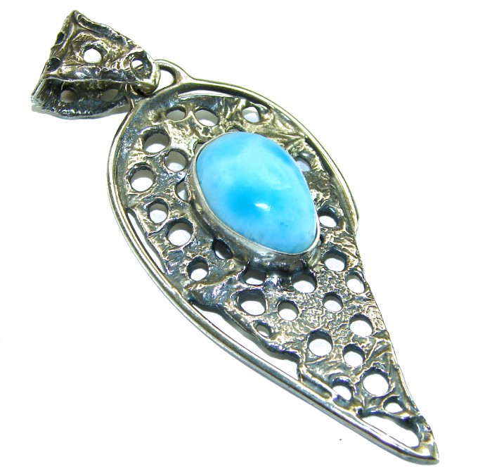The best quality Natural Larimar from Dominican Republic .925 Sterling Silver handcrafted pendant - Side view of silver pendant with blue Larimar stone