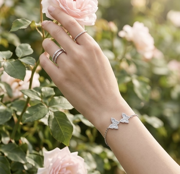Two white Butterflies natural 7.5 carat White Topaz .925 Sterling Silver handmade Statement Bracelet - Bracelet worn on hand among roses; butterfly design with white topaz.