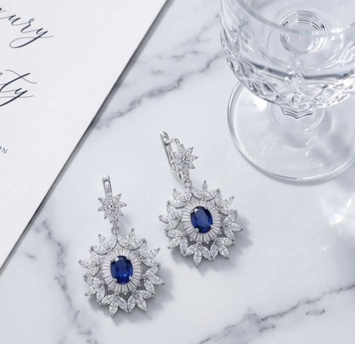 Art Deco - Incredible genuine 8.5 CARAT Sapphire .925 Sterling Silver handcrafted Earrings - Top view of Art Deco sapphire and diamond earrings on marble surface