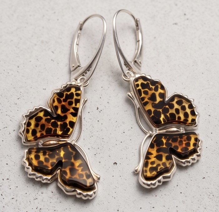 Butterflies carved Baltic Polish Amber rhodium over .925 Sterling Silver handcrafted earrings - Butterfly amber earrings, top view, silver setting, animal print design.