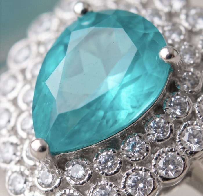 Isabella 4.2 carat Colombian Emerald .925 Sterling Silver dipped in Rhodium handcrafted Ring size 8 1/4 - Emerald ring stone close-up with diamond accents in sterling silver.