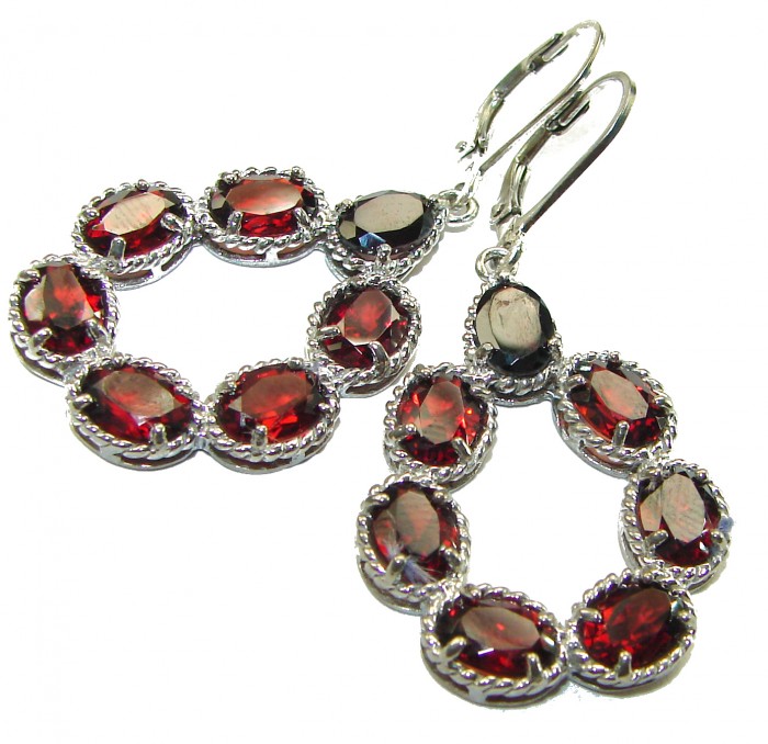 Red Royalty Authentic 22.9 carat Garnet .925 Sterling Silver brilliantly handcrafted earrings - Pair of garnet and silver earrings, front view, close-up detail.