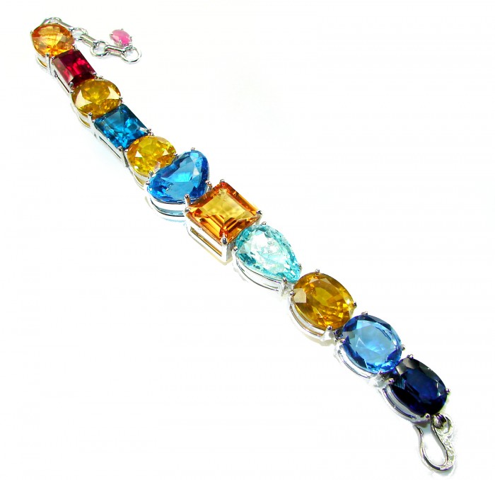 Tutti Frutti 65.5 CARAT MUTIGEM .925 Sterling Silver brilliantly handcrafted Bracelet - Colorful gemstone bracelet side view on white background.
