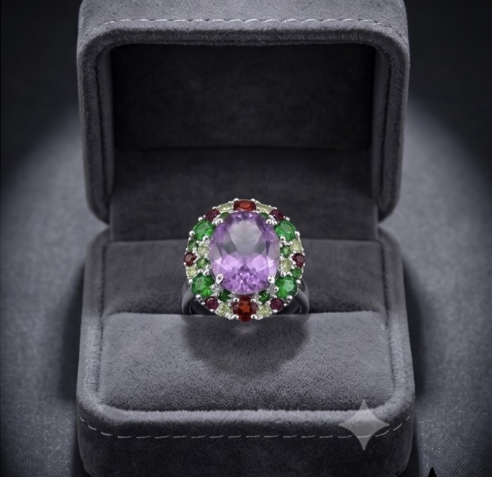 Lavender Beauty authentic 14.2 carat Amethyst .925 Sterling Silver dipped in rhodium handcrafted Ring size 8 1/4 - Amethyst ring in box, front view. Lavender stone with green and red accents.
