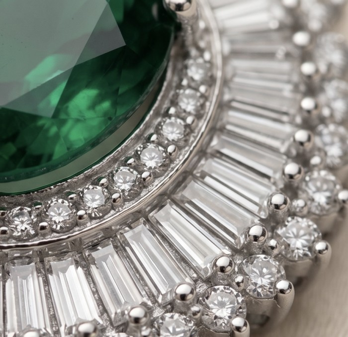 The Green Queen Natural 18.5 carat Emerald Moissanite .925 Sterling Silver handcrafted Necklace - Close-up of emerald and moissanite stones in intricate jewelry setting.