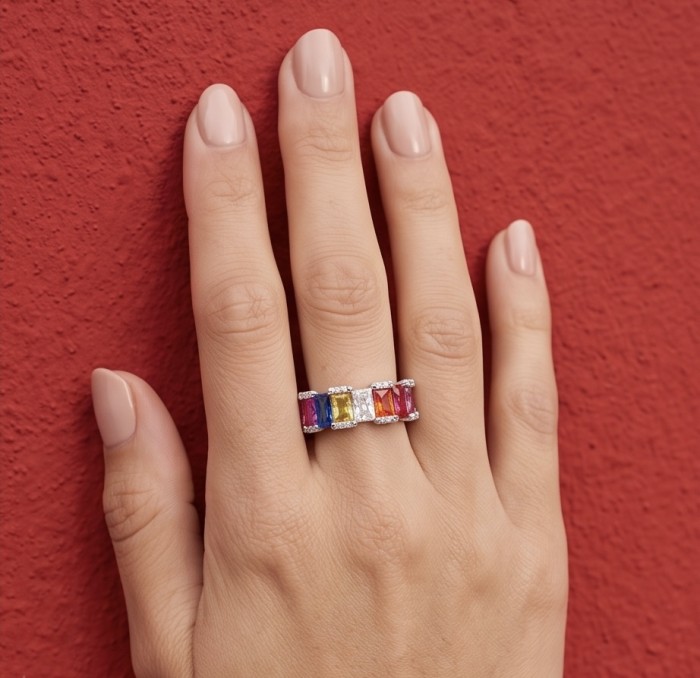 My own Rainbow - authentic 8.7 carat Topaz .925 Sterling Silver Ring size 7 - Rainbow Topaz ring on hand, showcasing stones against red background.