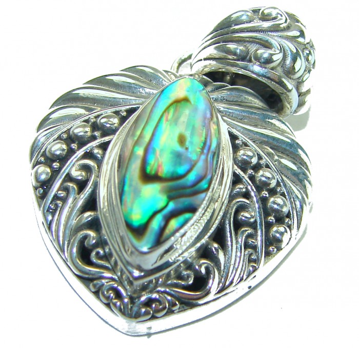 Gift of the Sea Natural Rainbow Abalone .925 Sterling Silver handmade Pendant - Close-up of abalone and sterling silver pendant with intricate design.