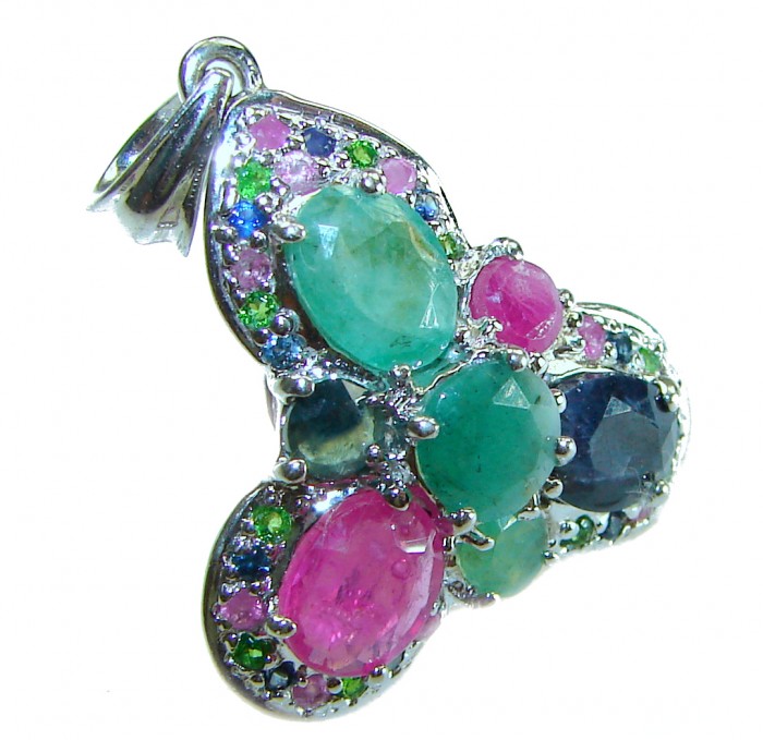 Authentic 12.5 carat Emerald Sapphire .925 Sterling Silver handcrafted Pendant - Close-up of multi-gemstone pendant with emerald and sapphire stones.