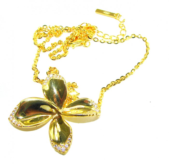 Lotus flower White Topaz highly polished 18K Gold over .925 Sterling Silver Italy made necklace - Gold lotus flower necklace with white topaz, angled view.