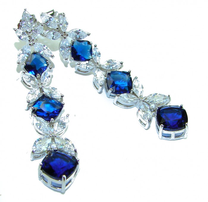 Gabriella 15.2 carat authentic Sapphire rhodium over .925 Sterling Silver handcrafted Statement earrings - Earrings with sapphires and clear stones, side view.