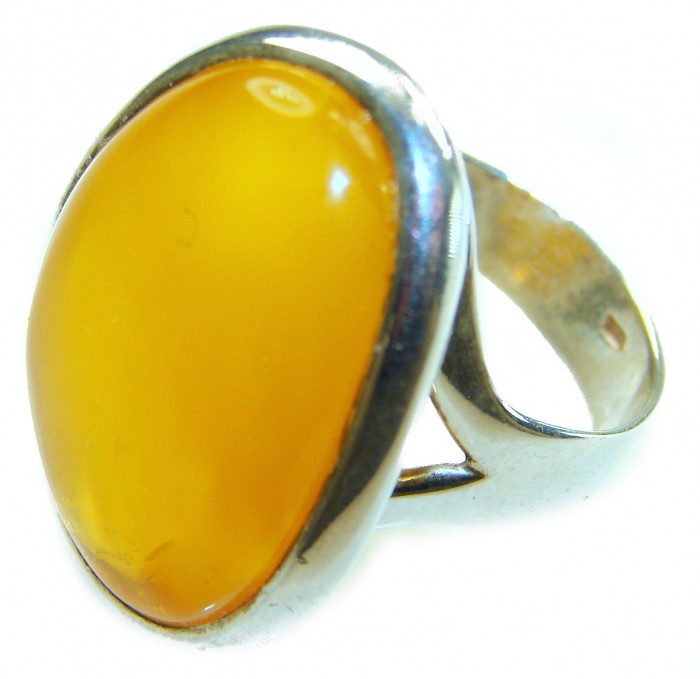 Authentic Golden Butterscotch Baltic Amber .925 Sterling Silver entirely handcrafted ring; s. 7 adjustable - Close-up of golden butterscotch Baltic amber ring in sterling silver.