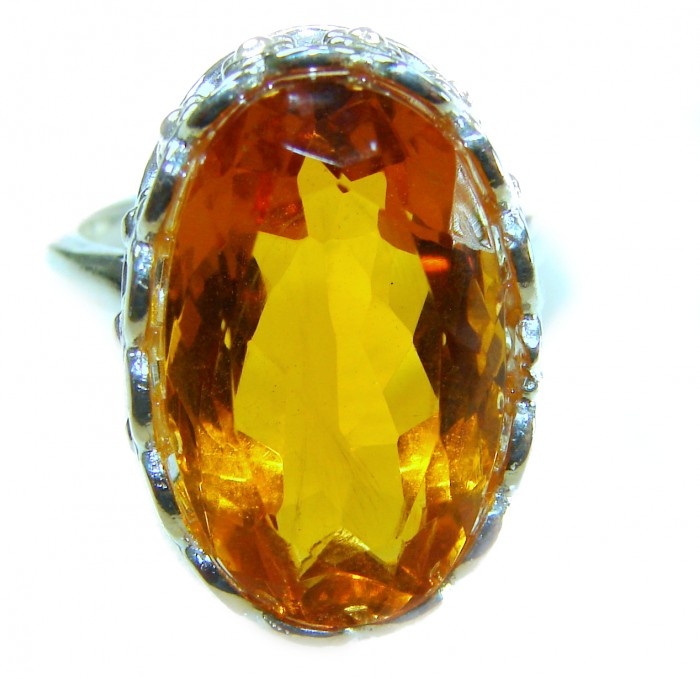Solid 22.8 carat Genuine Lemon Quartz .925 Sterling Silver handcrafted ring size 8 - Close-up of a large lemon quartz gemstone in a sterling silver setting.