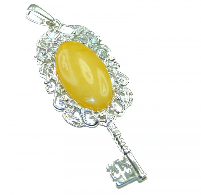 Golden Magic Key butterscotch Baltic Polish Amber .925 Sterling Silver handcrafted Pendant - Golden Magic Key pendant with amber, close-up angle.