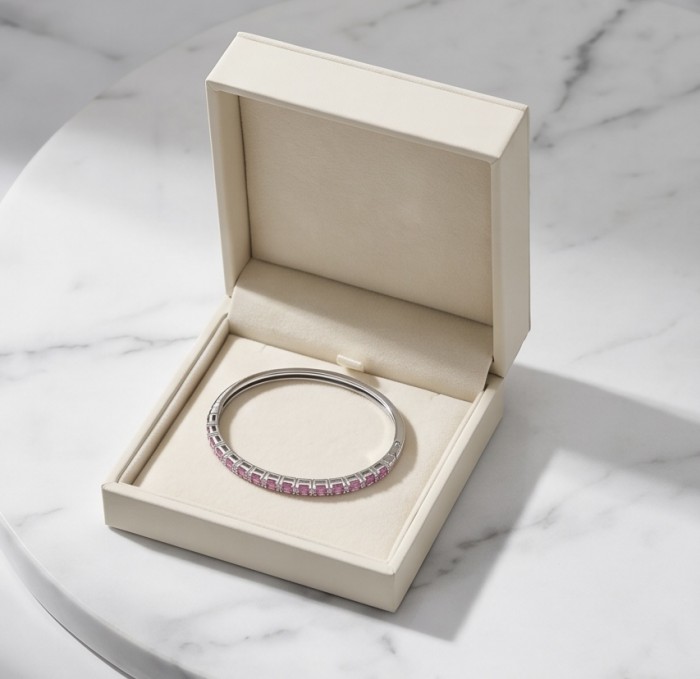 Art Deco Giovanna 7.2 carat Mozambique Ruby .925 Sterling Silver dipped in rhodium Statement Bracelet - Art Deco ruby bracelet in box, top view.
