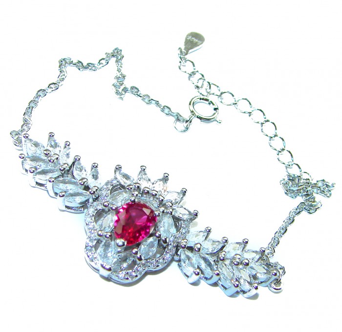 Natural 6.7 carat Ruby .925 Sterling Silver handmade Statement Bracelet - Ruby bracelet close-up on white background, showcasing clasp and stones.