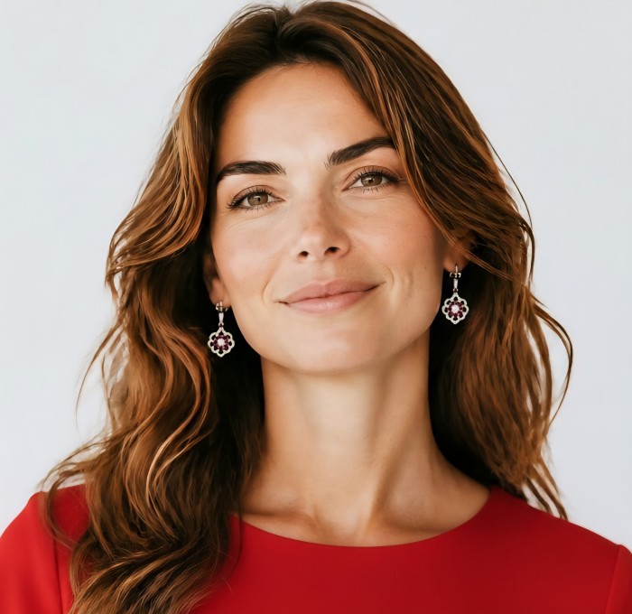 Giovanna - 4.5 carat Ruby .925 Sterling Silver handcrafted incredible earrings - Woman wearing Giovanna ruby earrings, front view.