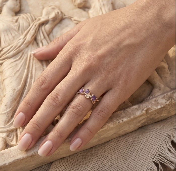 3.4 carat Amethyst 18K Rose Gold over .925 Sterling Silver Handcrafted Ring size 6 - Amethyst ring in 18K rose gold worn on hand, close-up view.