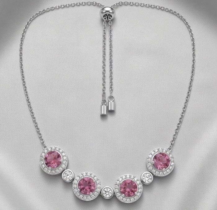 Serenade authentic 12.5 carat Brazilian Pink Topaz rhodium over .925 Sterling Silver handcrafted necklace - Front view of pink topaz necklace with rhodium finish on a display.