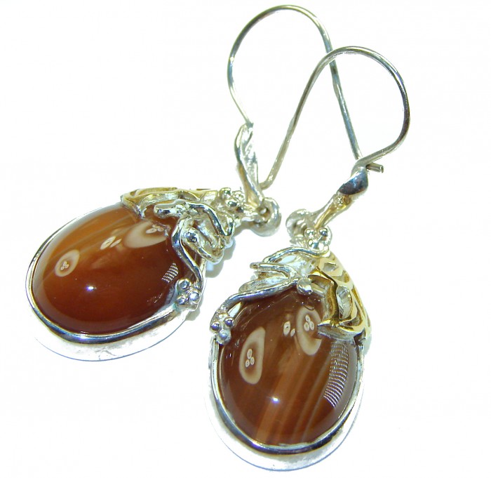 Sublime natural Orange Carnelian 2 tones .925 Sterling Silver handmade earrings - Close-up of orange carnelian earrings with silver detailing.