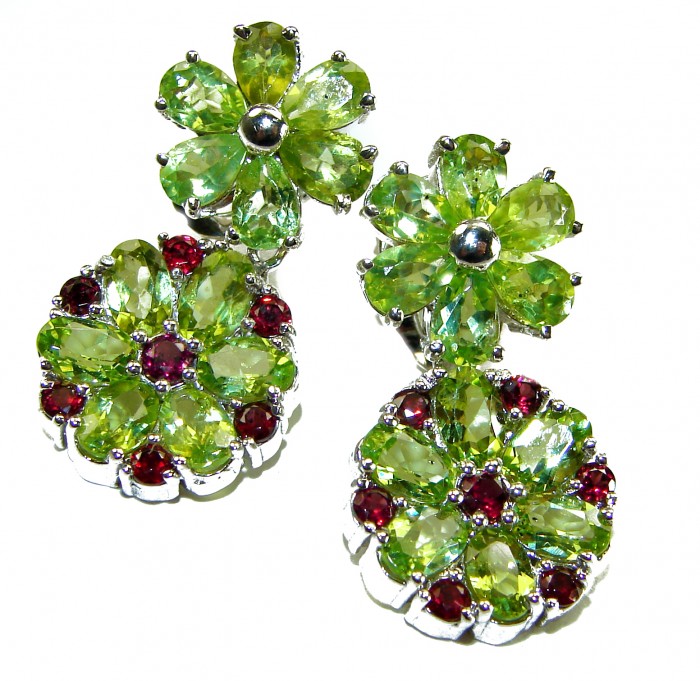 Mint Whisper - Great Masterpiece 32.2 carat genuine Peridot .925 Sterling Silver handmade Statement earrings - Close-up of Mint Whisper earrings with peridot and red gemstones.
