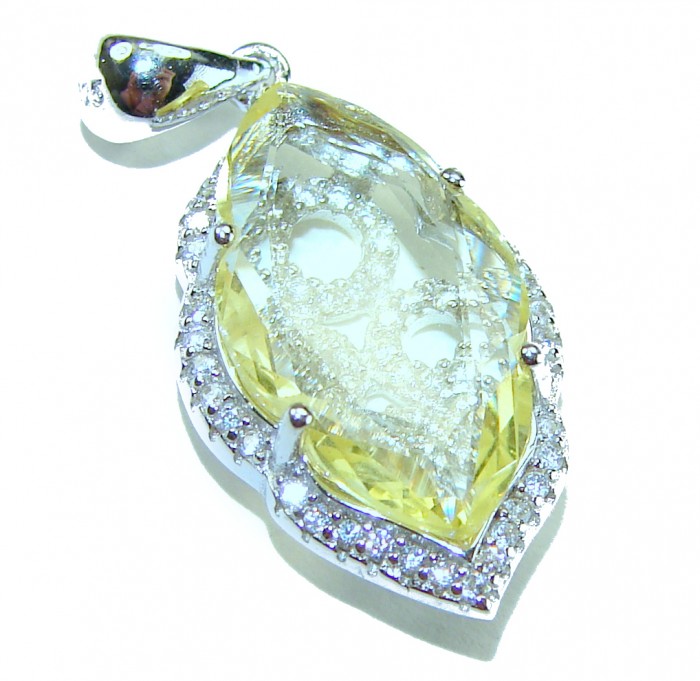 Divine Beauty 10.5 carat Lemon Quartz .925 Sterling Silver Handcrafted .925 Sterling Silver handcrafted pendant - Top view of lemon quartz pendant with sterling silver and sparkling stones.