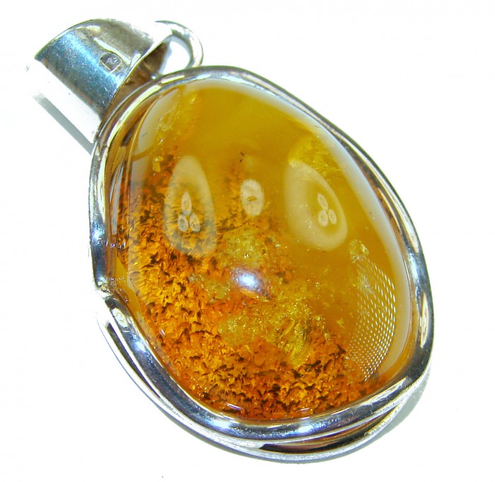 Prehistoric Authentic Baltic Amber .925 Sterling Silver beautifully handcrafted Pendant - Close-up of Baltic amber pendant set in .925 sterling silver.