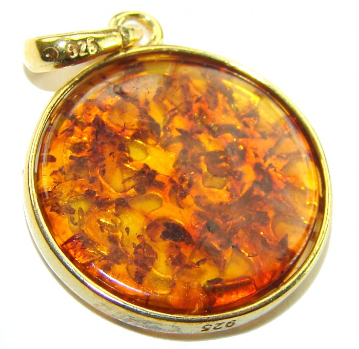 Perfect Balance Prehistoric Authentic Baltic Amber .925 Sterling Silver beautifully handcrafted Pendant - Close-up of Baltic amber pendant with .925 sterling silver setting