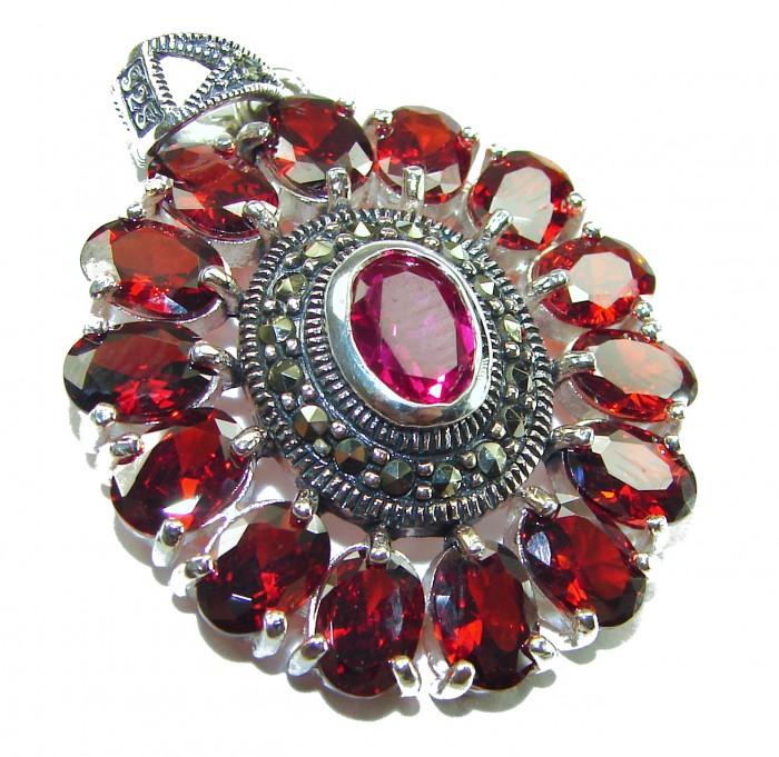 Circle of Life 15.2 carat authentic Ruby Marcasite .925 Sterling Silver handmade Pendant - Close-up of Circle of Life pendant with red rubies and marcasite accents