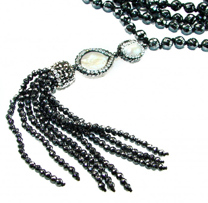 Boho Style Genuine Titanum Crystal .925 Sterling Silver handmade necklace 34 inches long - Close-up of boho style necklace with tassel and crystals.