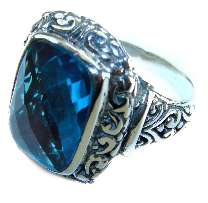 Blue Dreamer 25.5 carat London Blue Topaz .925 Sterling Silver Perfectly handcrafted Ring s. 7 1/2 - Close-up of Blue Dreamer ring with London Blue Topaz stone and ornate details.