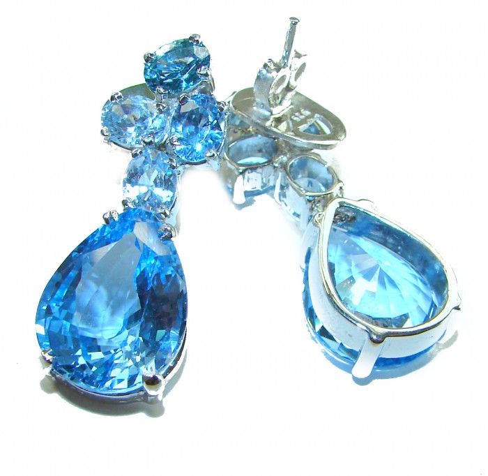 Blue Odyssey 29.5 carat authentic Swiss Blue Topaz .925 Sterling Silver handmade Statement earrings - Close-up of Swiss Blue Topaz earrings with teardrop stones.