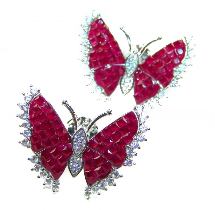 Real Beauty natural 11.9 carat Ruby Butterflies .925 Sterling Silver handcrafted earrings - Butterfly-shaped ruby earrings, top view, with diamond accents.