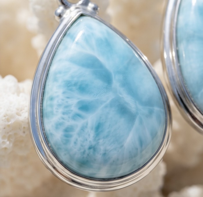Caribbean Beauty Genuine 10.5 carat Blue Larimar .925 Sterling Silver handmade earrings - Close-up of teardrop-shaped blue Larimar set in silver.