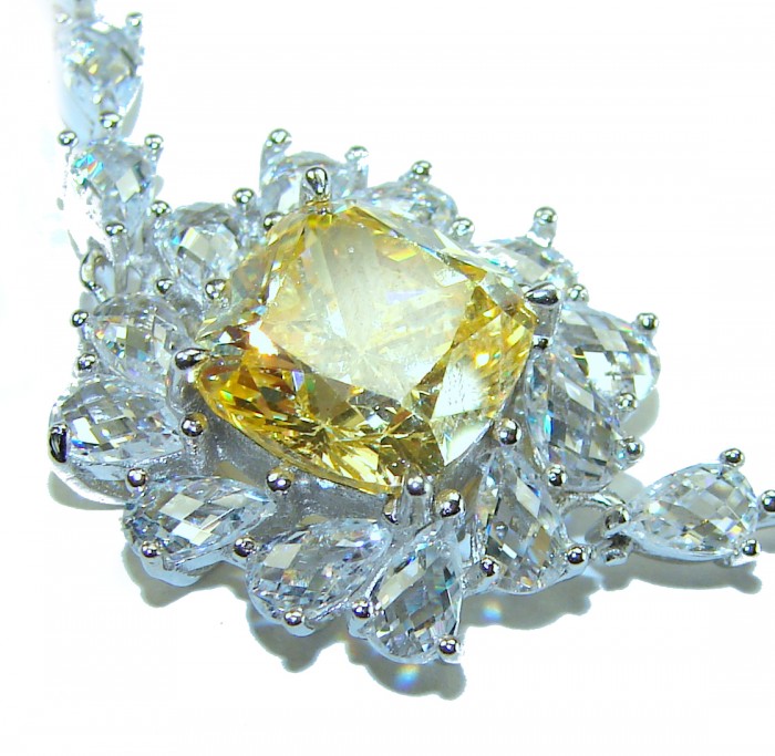 Luxurious 22.5 carat pricess cut Authentic Yellow Sapphire .925 Sterling Silver handcrafted Statement Bracelet - Close-up of luxurious yellow sapphire with diamond accents.