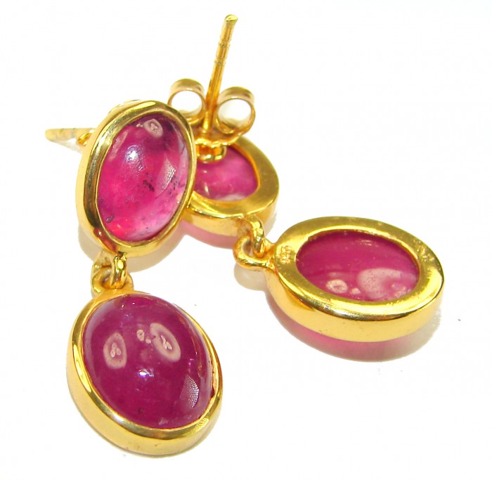 Countless Blessings Genuine 9.5 carat Authentic Mozambique Ruby 18K Gold over .925 Sterling Silver handcrafted earrings - Close-up of gold earrings with oval pink gemstones.