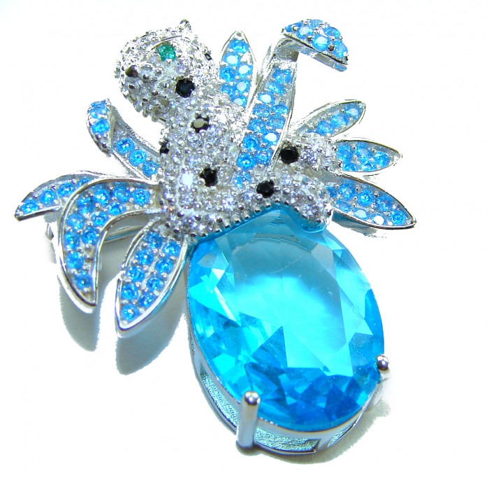 Blue Cheetah authentic 12.5 carat Swiss Blue Topaz .925 Sterling Silver Handcrafted pendant brooch - Blue cheetah brooch with Swiss Blue Topaz, top view close-up.