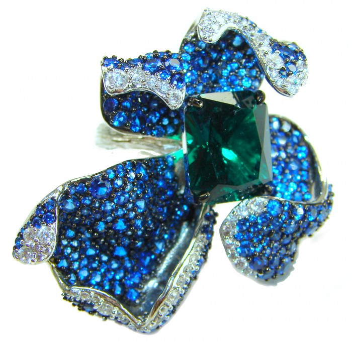 Wild Flower 55.2 carat authentic Colombian Emerald Sapphire.925 Sterling Silver handcrafted Statement Ring size 6 1/4 - Close-up of blue sapphire and emerald flower-shaped jewelry piece