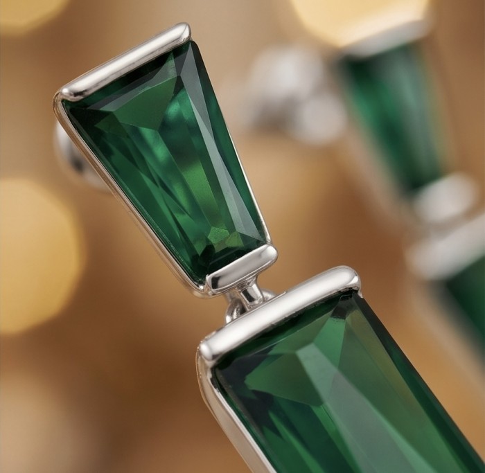 Amazing authentic 8.2 carat Green Helenite .925 Sterling Silver earrings - Close-up of green Helenite stones set in .925 sterling silver.