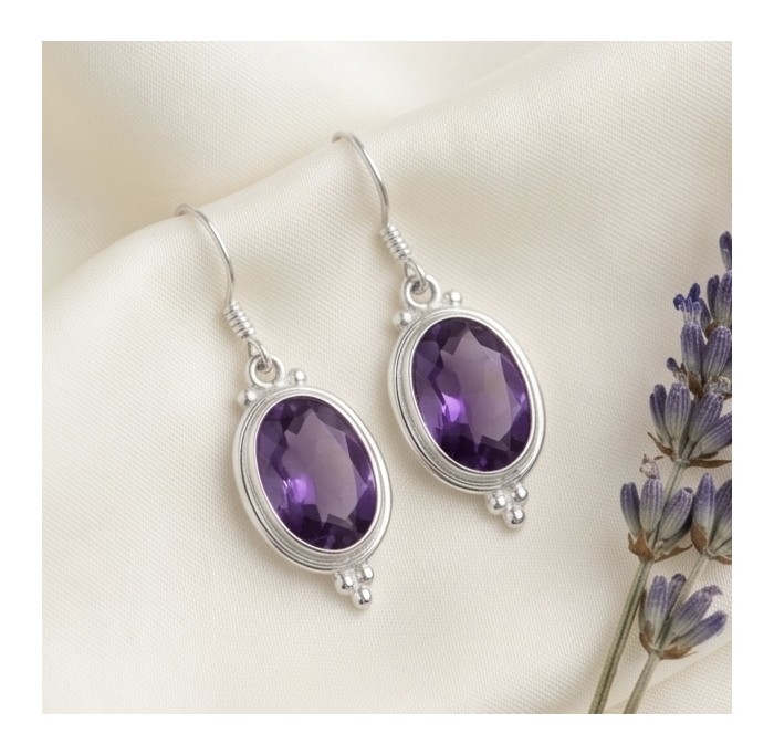 Lavender Beauty authentic 10.2 carat Amethyst .925 Sterling Silver handcrafted earrings - Amethyst earrings on fabric, front view, with lavender sprigs.