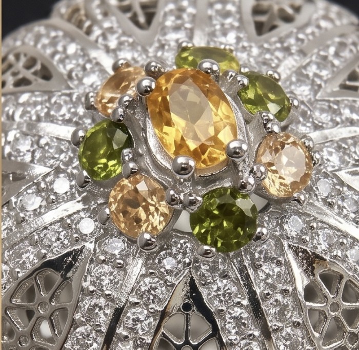 Casablanca Italy made 1.8 carat yellow Sapphire .925 Sterling Silver brilliantly handcrafted ring s. 6 1/2 - Close-up of yellow sapphire and green stones on ornate sterling silver.