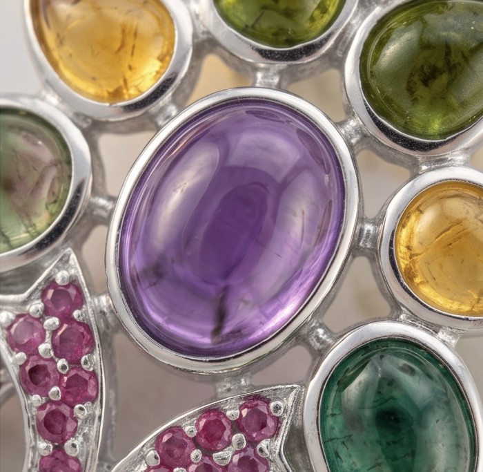 Dolce Vita Genuine 15.9 carat Brazilian Amethyst rhodium over .925 Sterling Silver handcrafted Statement handcrafted earrings - Close-up of multicolored gemstone set in rhodium.