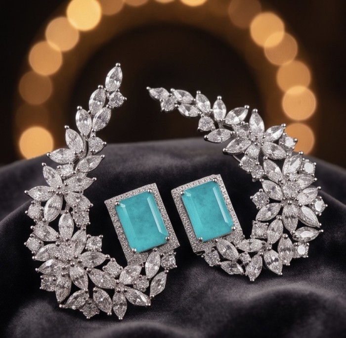 Royalty 4.2 carat Paraiba Tourmaline .925 Sterling Silver entirely handmade earrings - Elegant earrings close-up, Paraiba Tourmaline, silver leaf design.